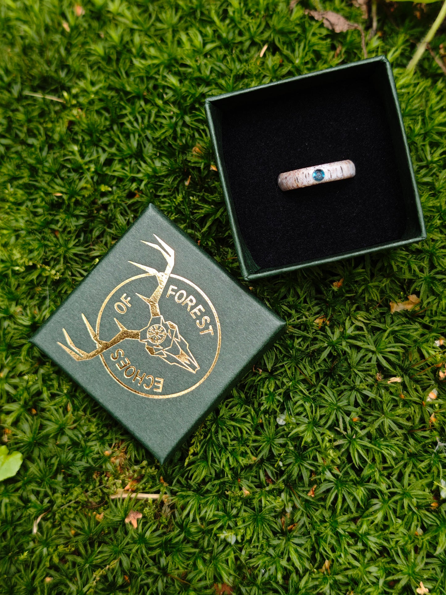 The antler ring with Blue Topaz in a gift box