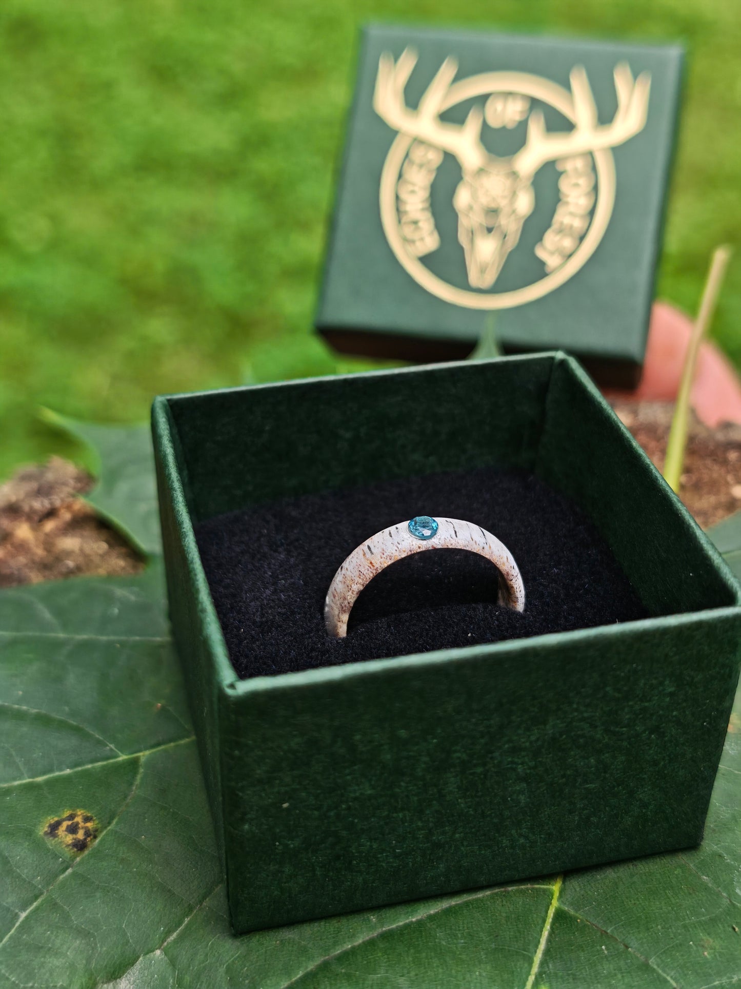 The antler ring with Blue Topaz in a gift box