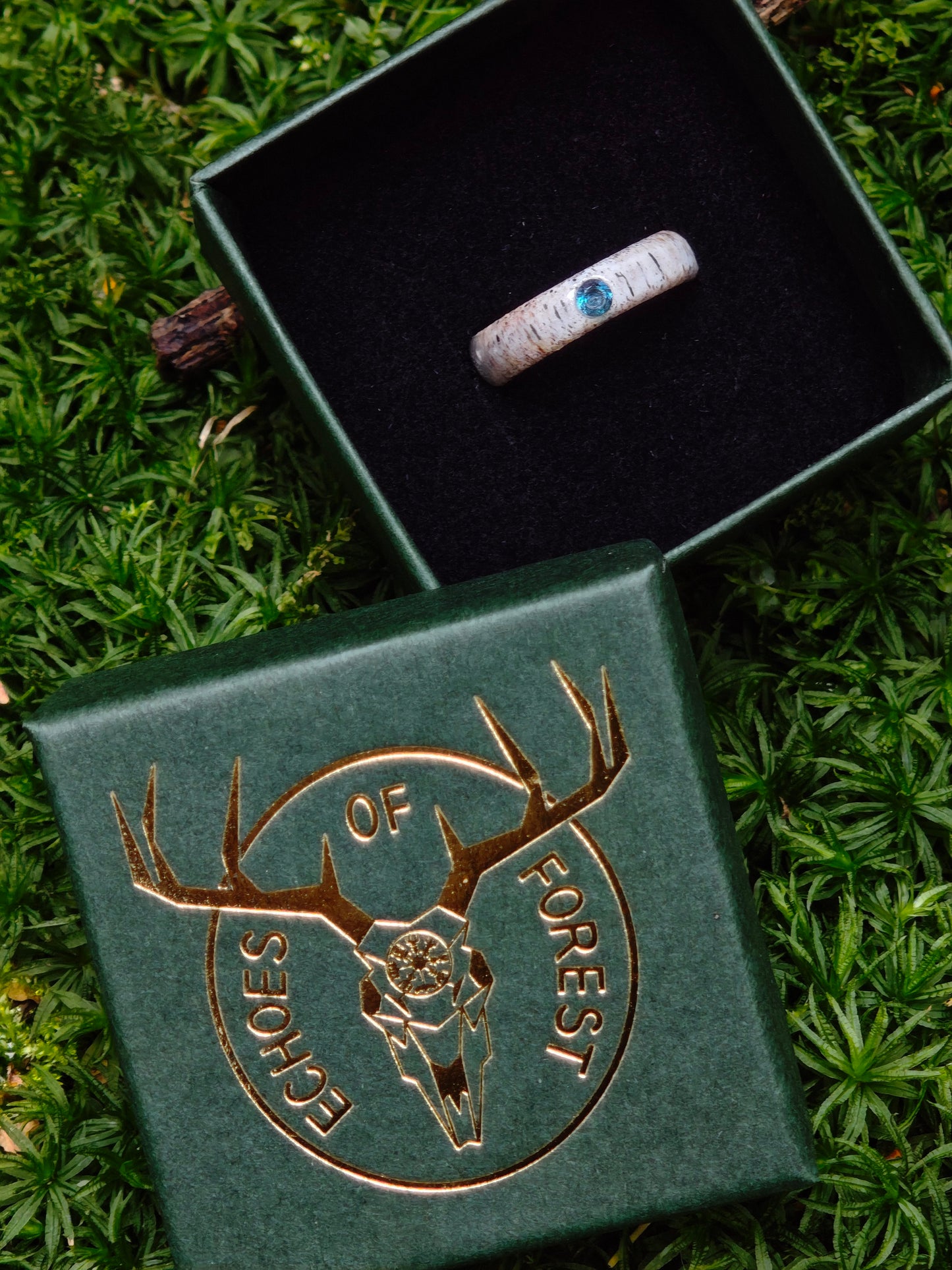 The antler ring with Blue Topaz in a gift box