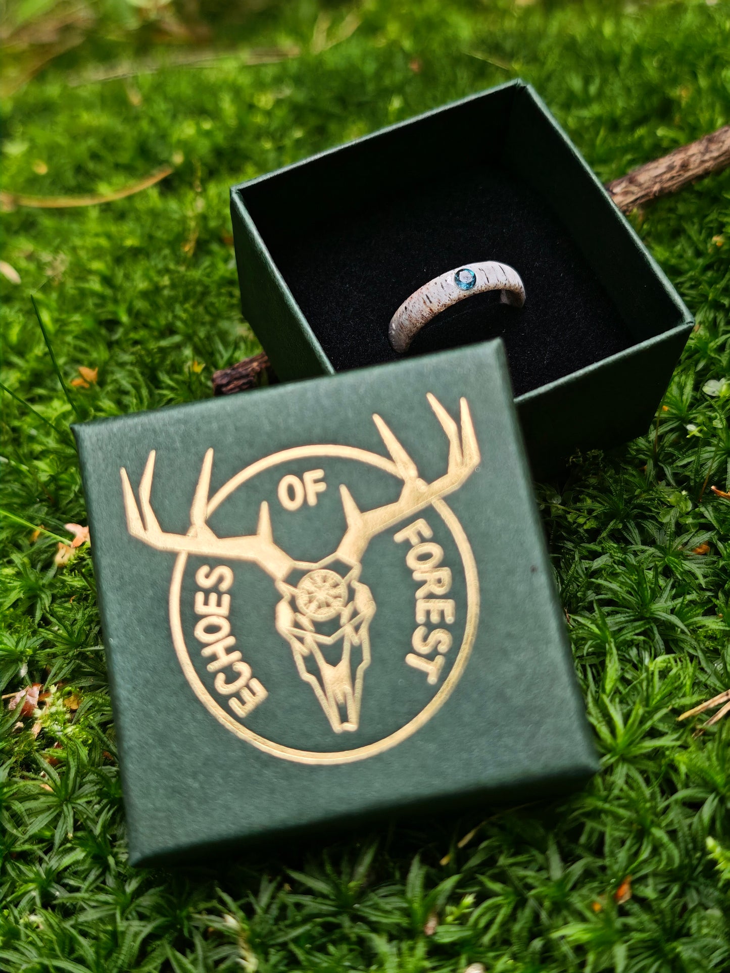 The antler ring with Blue Topaz in a gift box