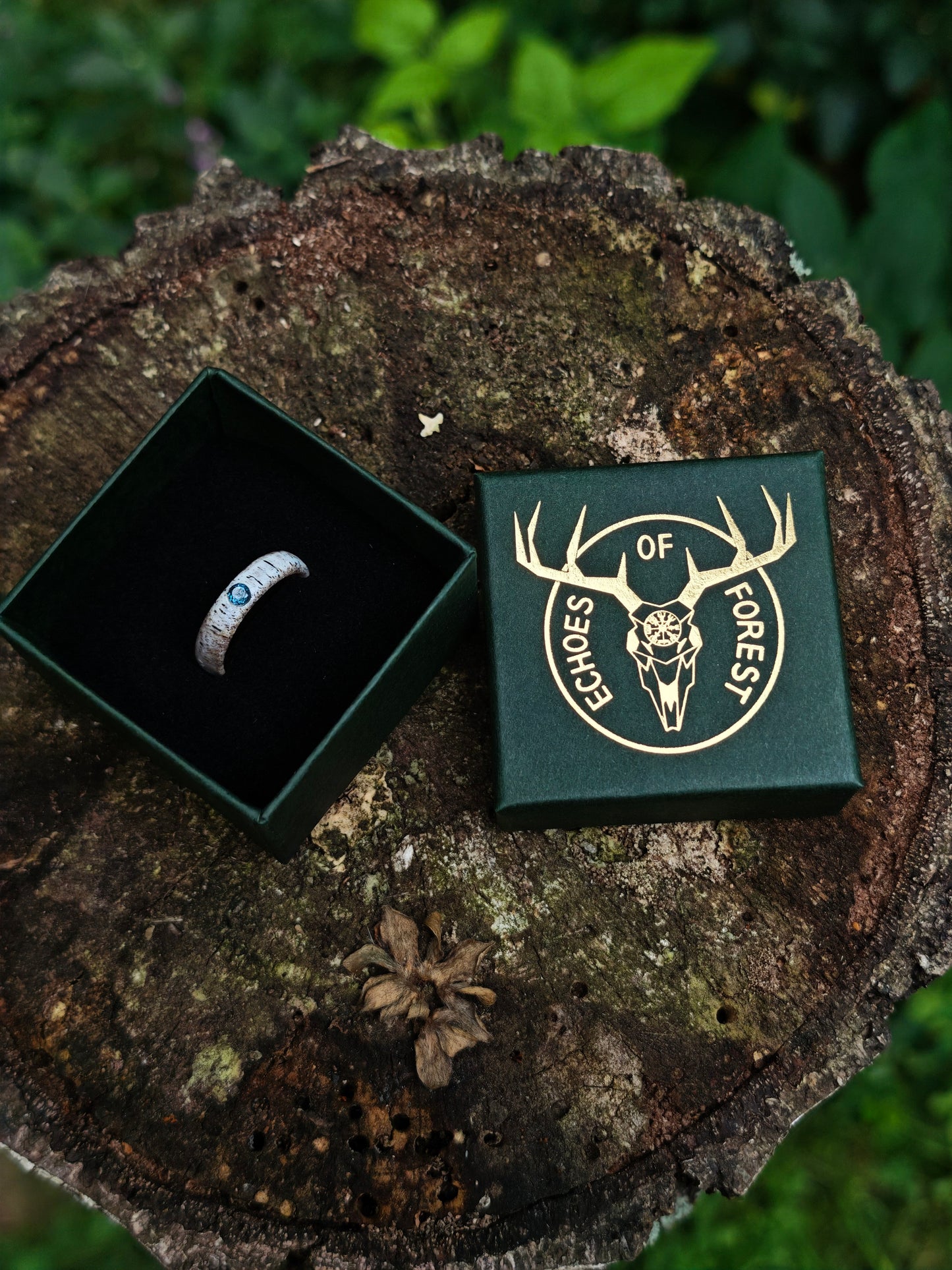 The antler ring with Blue Topaz in a gift box