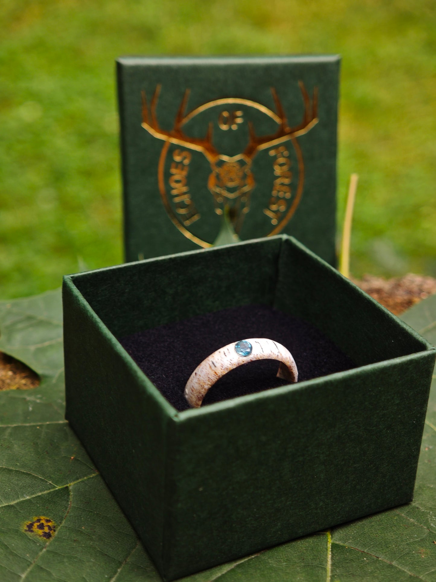 The antler ring with Blue Topaz in a gift box