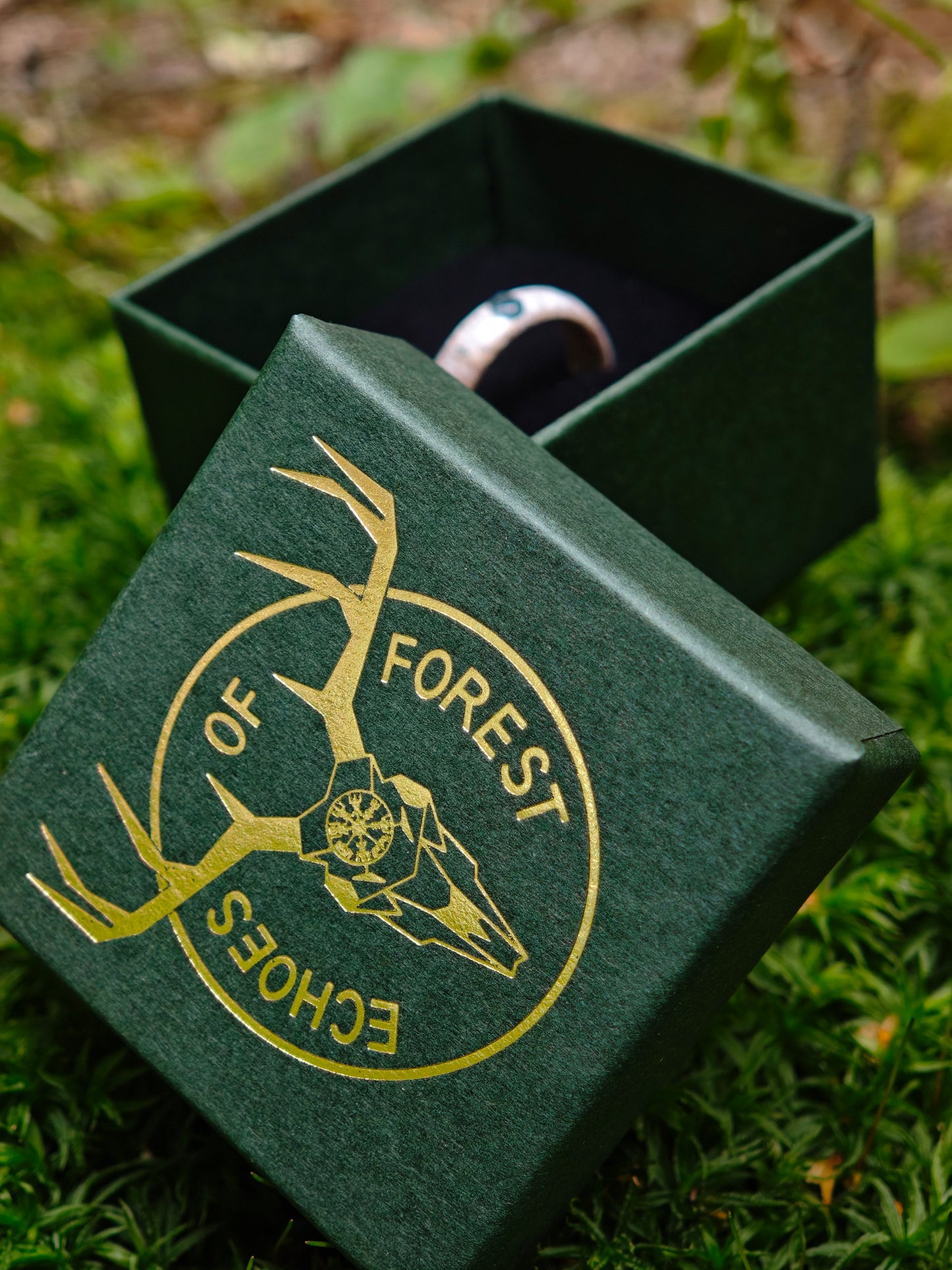 The antler ring with Blue Topaz in a gift box