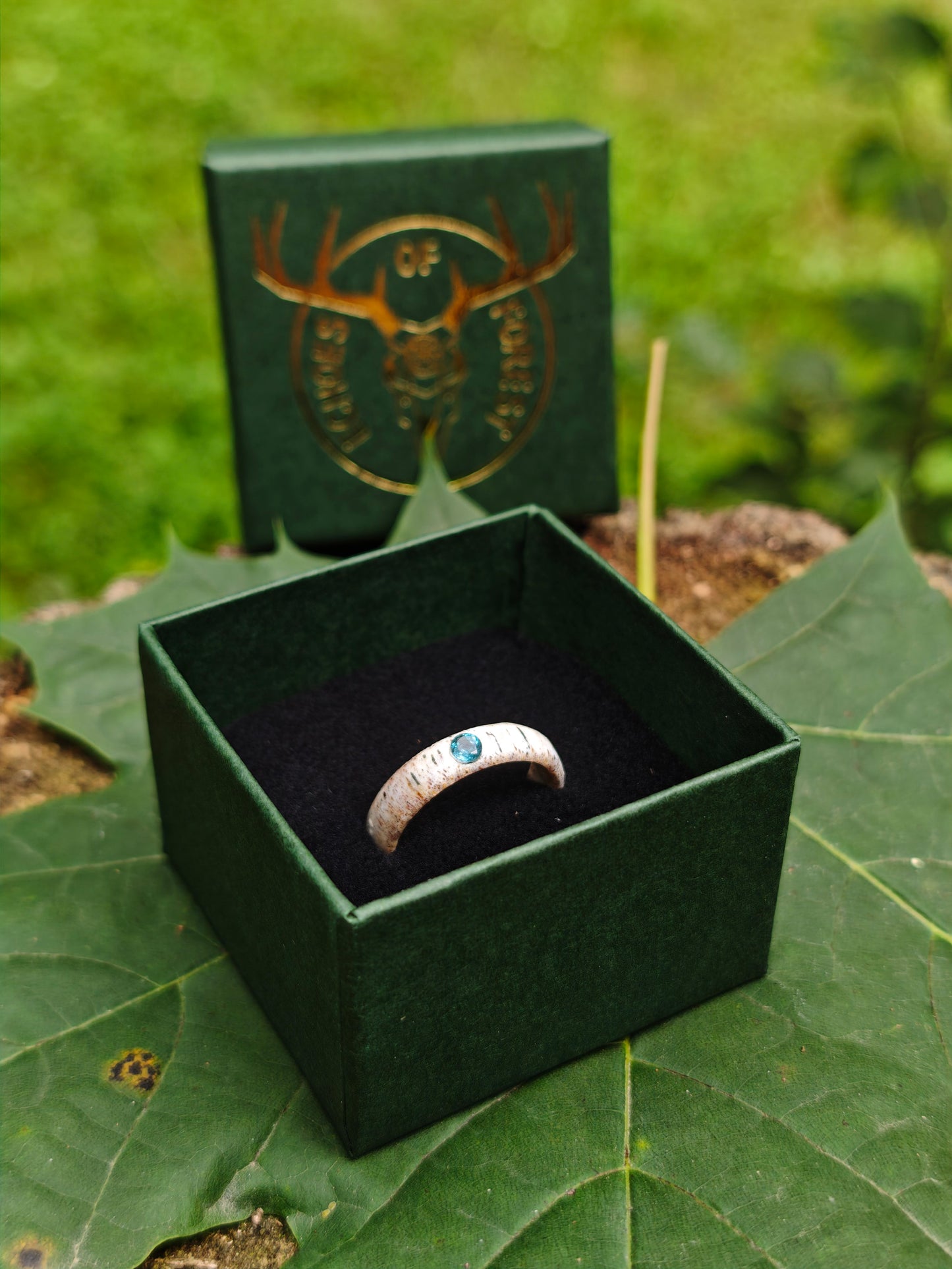 The antler ring with Blue Topaz in a gift box