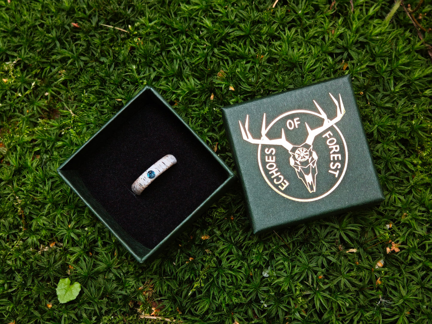 The antler ring with Blue Topaz in a gift box