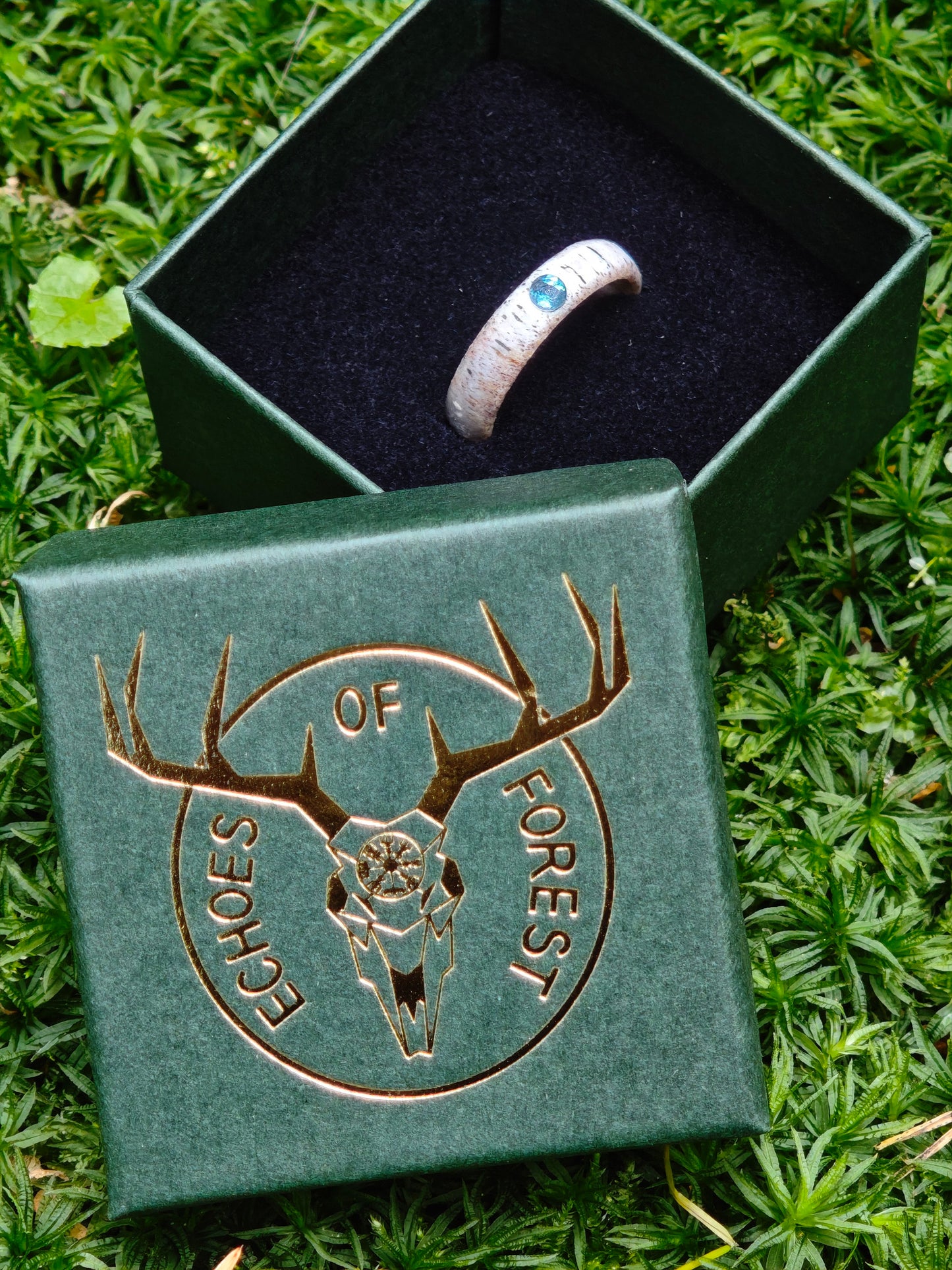 The antler ring with Blue Topaz in a gift box