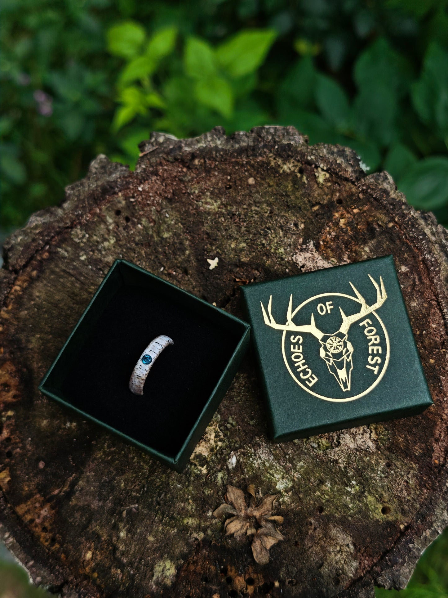 The antler ring with Blue Topaz in a gift box