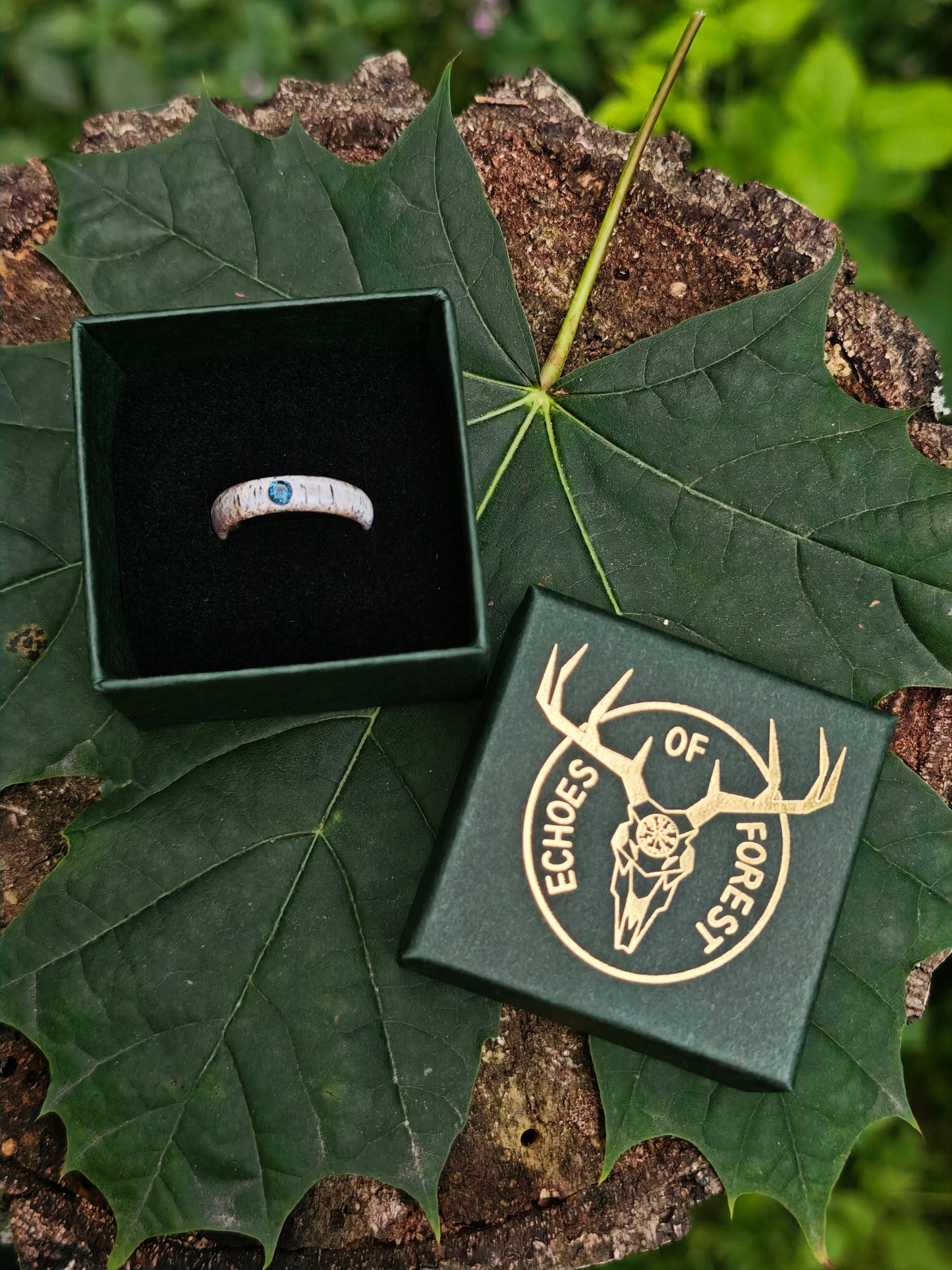 The antler ring with Blue Topaz in a gift box
